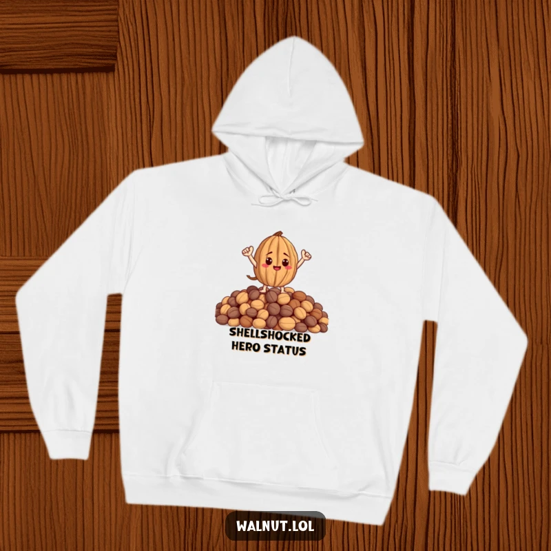 Funny hoodie showcasing a walnut character with arms striking a heroic pose on a pile of nuts, perfect for cozy days.