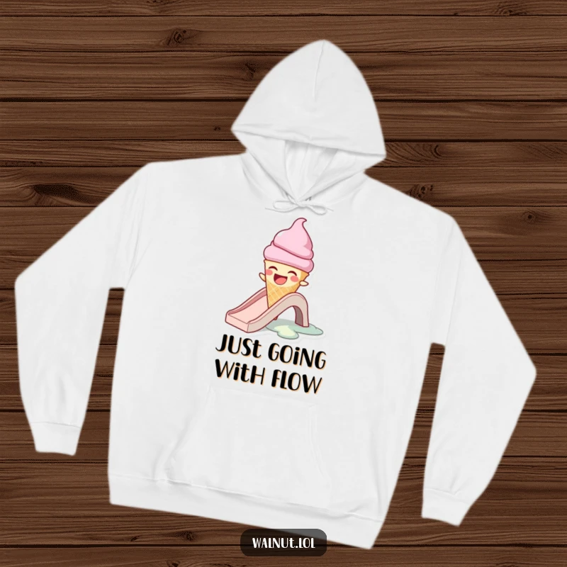 Funny hoodie showing a laughing ice cream cone character melting on a slide, offering comfort and humor for colder weather.